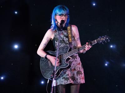 A musician performs at an open mic session