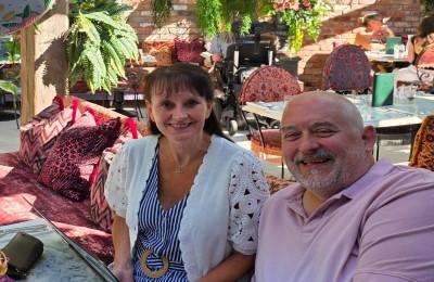 Sue and Dave Cook sat together at a table