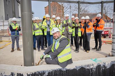 Cllr Anthony Burns, Leader St Helens Borough Council, with VIP guests at the St Helens Transport Interchange golden spanner ceremony